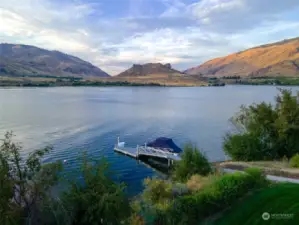 View of home with 535' of waterfront on the Columbia River with private dock and 9,000lb boat lift on 12 acres, looking towards Turtle Rock.