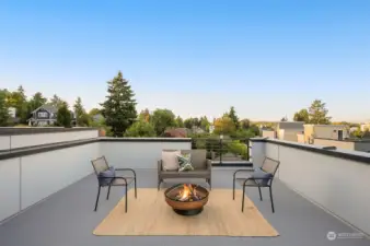 Elevate your living with this stunning rooftop deck, perfect for relaxing evenings by the fire and enjoying the expansive views. Your private outdoor oasis awaits!