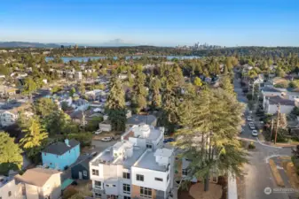 Take in the picturesque surroundings of Greenwood and beyond. This aerial view showcases the perfect blend of city and nature with Mt. Rainier on the horizon.