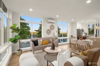 Bask in the glow of natural light flooding this spacious living room. Designed with comfort and style in mind, it's the perfect place to unwind while enjoying the view from every window.