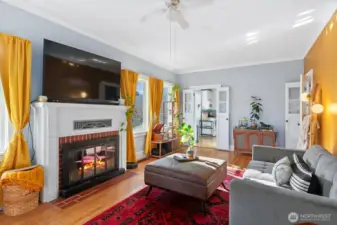 Unique to this home are the sweet French doors leading to the kitchen and also to the hallway.