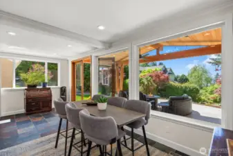 4-season, fully enclosed sunroom with door to covered patio