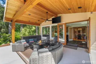 New covered patio with outdoor kitchen, sound system & ceiling fan