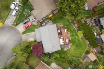 Aerial view of home in cul-de-sac.