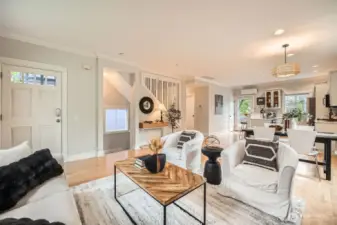 Nice architectural elements like the open stairwell add to a sense of openness and connection to the upper floor