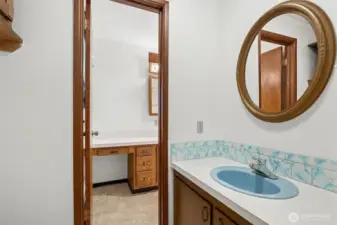 1/2 bath with door to shared full bath.