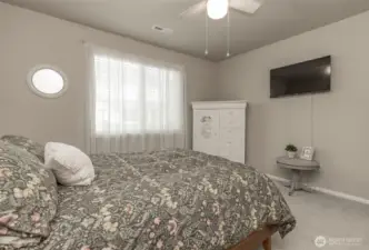 Another view of primary bedroom