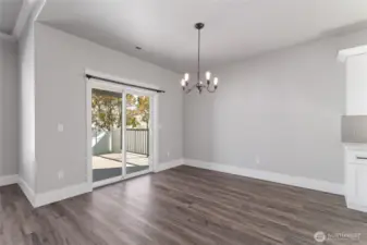 Bright and inviting, the spacious dining area flows seamlessly into the open-concept living space—perfect for entertaining and effortless everyday living