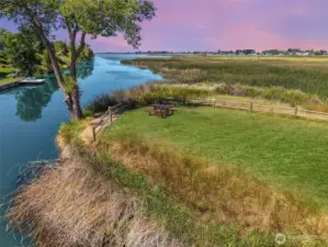 A rare Amenity! Relax and unwind at the private community beach, offering serene waterfront views and direct lake access for residents