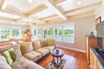 Custom Huntwood hickory built-in cabinetry and hand-scraped hickory hardwood floors throughout.