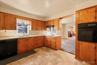 Plenty of cupboard space in this over-sized kitchen.