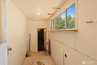 Laundry room off of kitchen.