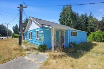 View of kitchen entry from driveway.  Door to the left is kitchen, door to the right is laundry and storage.