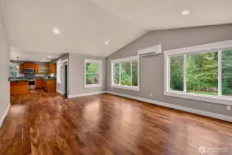 Looking back to the kitchen from the living room.  Look at those views out the windows!