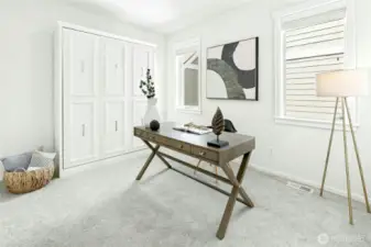 This bedroom doubles as a perfect flex office as well! The cabinet shown here is a queen size murphy bed that can easily be lowered for overnight guests.