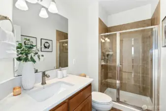 This downstairs bathroom is adjacent to the bedroom, making for perfect guest quarters!