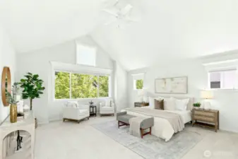 (sigh) Take a moment to apapreciate the volume and height of this primary suite. Millwork, windows and a ceiling fan are each worth a pause as you take it all in.