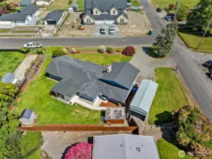 Two detached storage sheds, a fully fenced yard, covered awing & a huge RV carport. Wow!