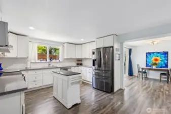 Quartz counters & stainless appliances.