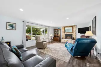 Living room with a gas fireplace.