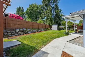Large & fully fenced yard.