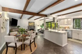 Crisp white quartz counters, quality cabinets and extra bar seating around the kitchen island.
