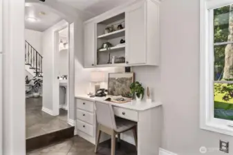 With convenient workstation, storage cabinets and built in desk.