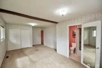 View of the primary suite showing the private full bath