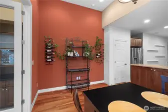 Beautifully updated kitchen featuring quartz countertops, hardwood floors, a new gas oven and range, dishwasher, and microwave. Upgraded cabinetry with pull-out shelves and a charming eat-in space make this kitchen both stylish and functional.