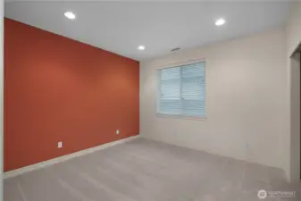 Comfortable second bedroom featuring brand new carpet and a custom-designed closet system...fresh, functional, and ready to make your own.