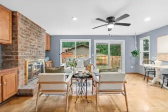 den with gas fireplace with double sider to wrap around deck