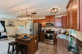 Kitchen with island and dining room