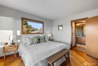 Primary Bedroom looking into the primary bathroom.