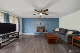 Large windows in living room. Great for letting in natural light.