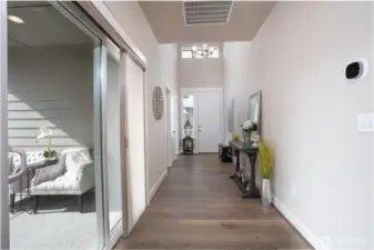 Off of the entry way is the first of two patios and this one is covered- making it the perfect spot to cozy up, even on our rainy days.  This is one of the few homes in Ovation to have two patios- these sellers knew what they were doing and what they wanted- you'll thank them for their great planning.