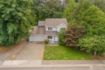 Nice neighborhood with sidewalks and trees all around.