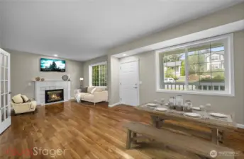 Cozy front living room and dining room combo. Or reading area, tv room, you decide!