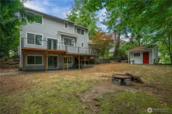 Another view of the backyard and storage shed. So much room here!