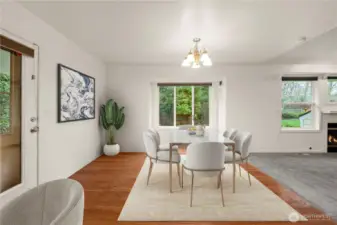 Virtually staged dining room off of kitchen