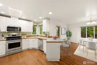 Virtually staged Spacious kitchen w/ newer SS appliances