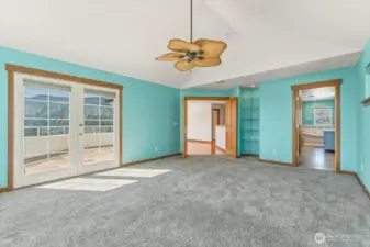 Large primary suite with french doors to the upper view deck