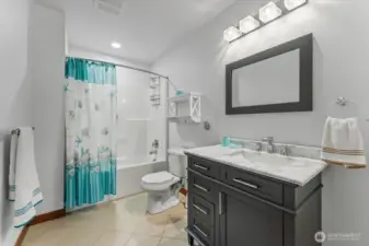 Full Bathroom in living space above the shop