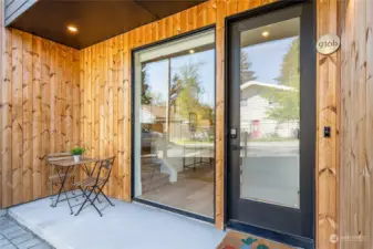 This great covered patio makes for a great foyer into the unit, or a nice place to sit and sip morning coffee.