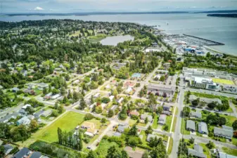 Aerial of the City of Port Townsend out to the Strait of Juan de Fuca, Port Townsend Bay, Cascade Mountains and Mt Baker.