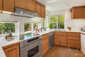 Enjoy an efficient kitchen featuring sleek stainless steel appliances and basking in the warmth of sunny southern exposure.