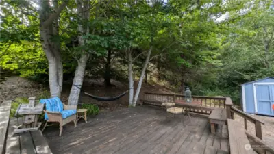 Beautiful treed lot with gracious deck for entertaining.