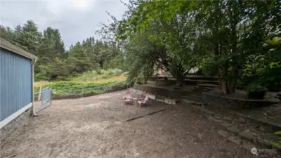 Large private back yard with terraces.