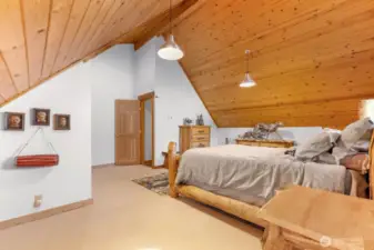 Upper Bedroom with ensuite Bath is private and spacious. Carpeted. Bathroom Slate tile. Lots of natural light. And oh so quiet! Sleep well.