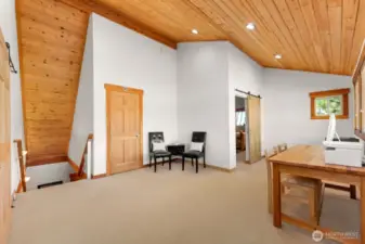 Bonus room Loft area offers computer area with a mountain view.