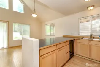 Nice natural light. Kitchen with eating bar